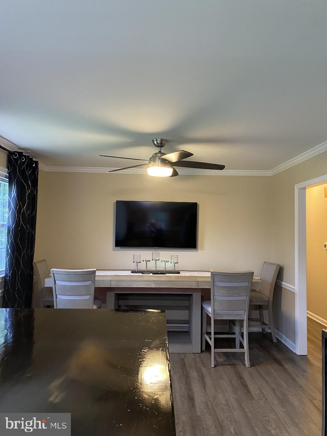 37715 Apache Road Charlotte Hall, MD 20622 - Photo 16 of 35 a view of a livingroom with furniture and a flat screen tv