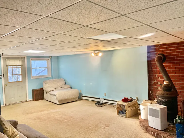 a bedroom with a bed and a table