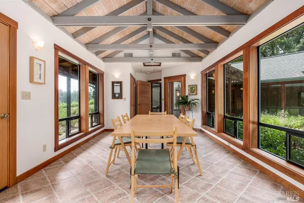 a view of a room with a large window