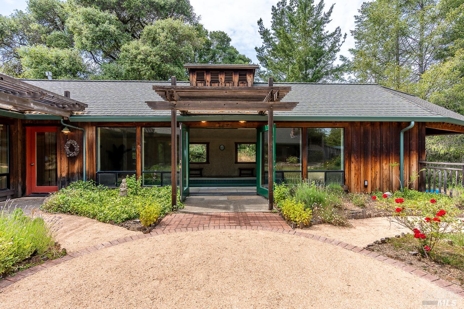2151 Guntly Road Philo, CA 95466 - Photo 18 of 43 a front view of a house with garden