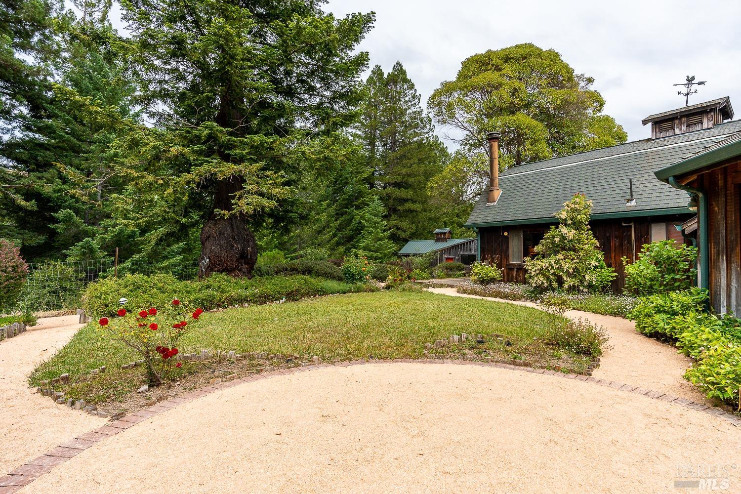 2151 Guntly Road Philo, CA 95466 - Photo 22 of 43 a front view of a house with a garden