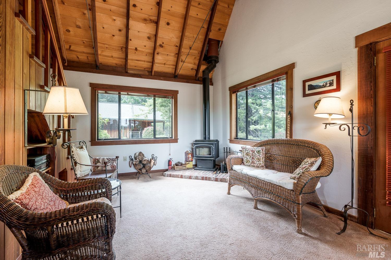 2151 Guntly Road Philo, CA 95466 - Photo 10 of 43 a living room with furniture and a large window