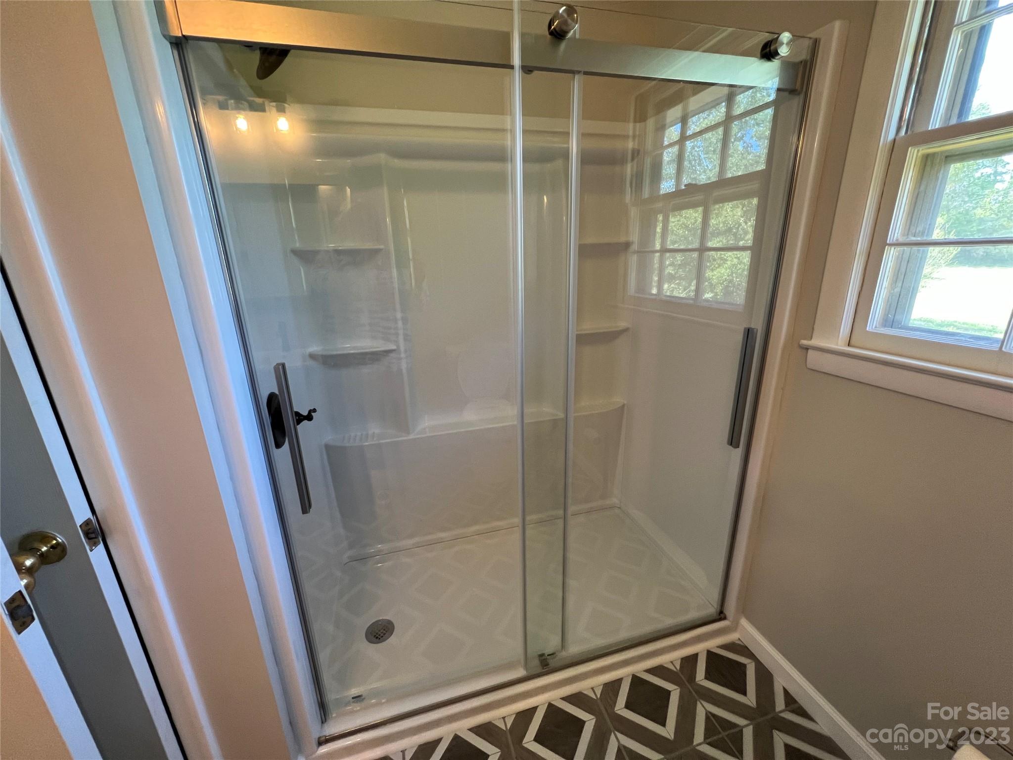 590 Hog Pen Branch Road Mooresboro, NC 28114 - Photo 15 of 36 a bathroom with a shower