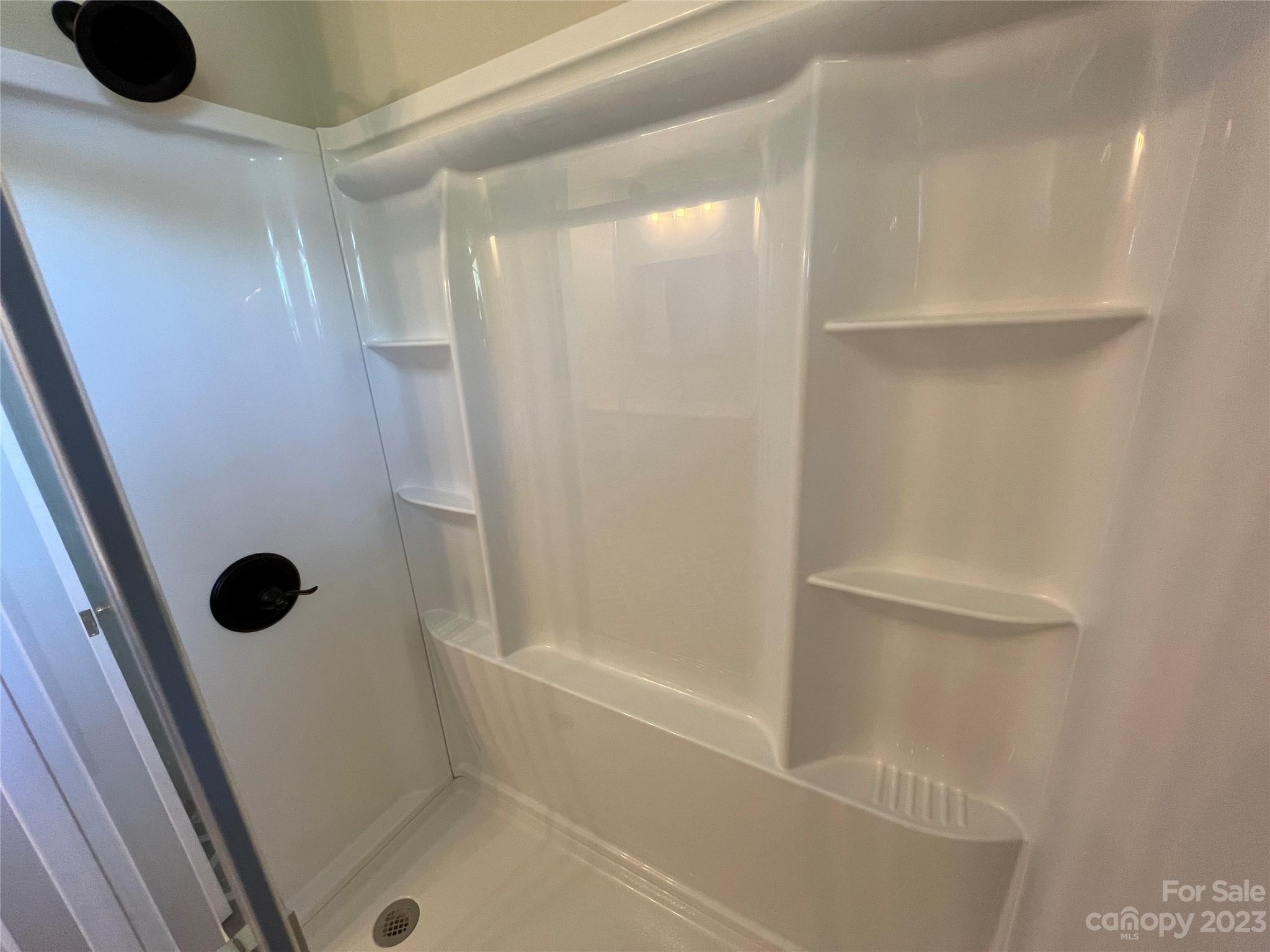 590 Hog Pen Branch Road Mooresboro, NC 28114 - Photo 17 of 36 a bathroom with a shower