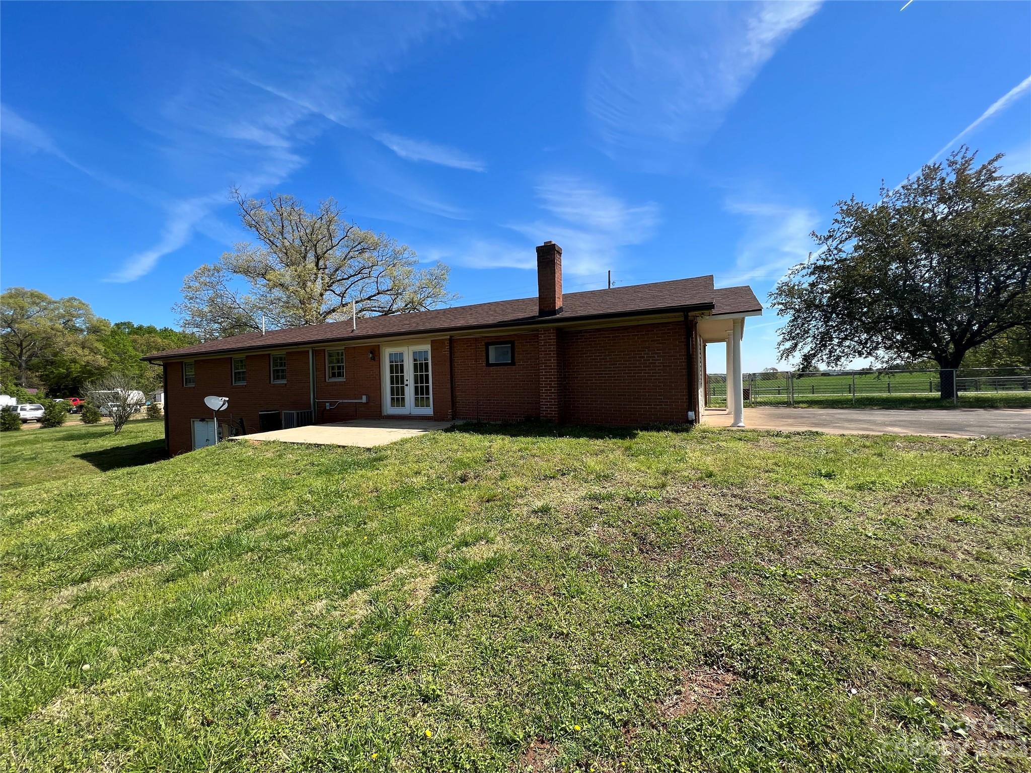 590 Hog Pen Branch Road Mooresboro, NC 28114 - Photo 4 of 36 a front view of a house with a yard