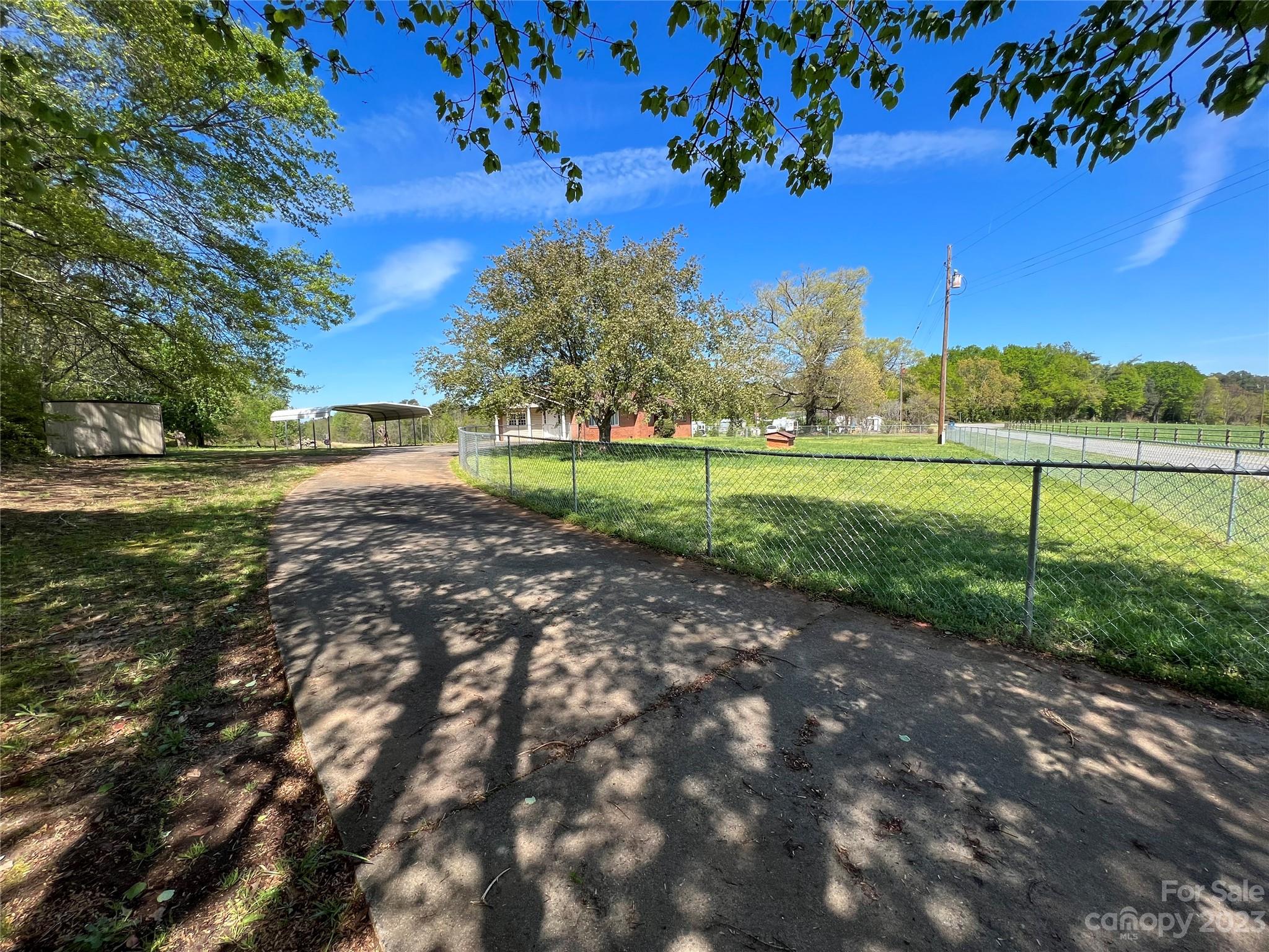 590 Hog Pen Branch Road Mooresboro, NC 28114 - Photo 5 of 36 a view of an outdoor space and a yard