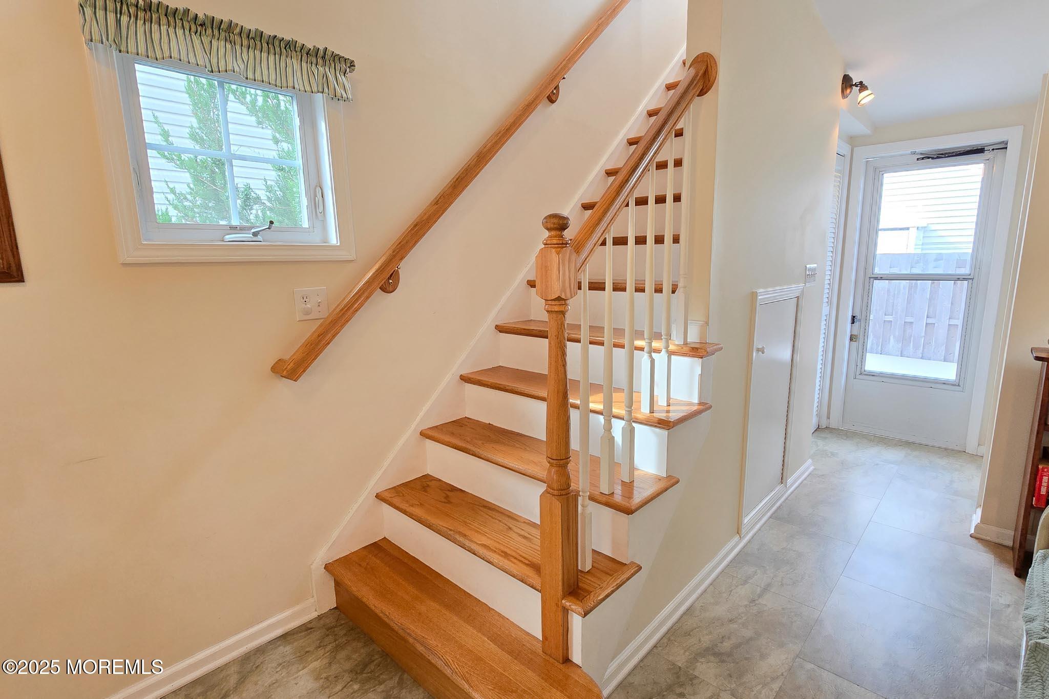 34 South Surf Road Lavallette, NJ 08735 - Photo 31 of 63 a view of entryway with wooden floor and stairs