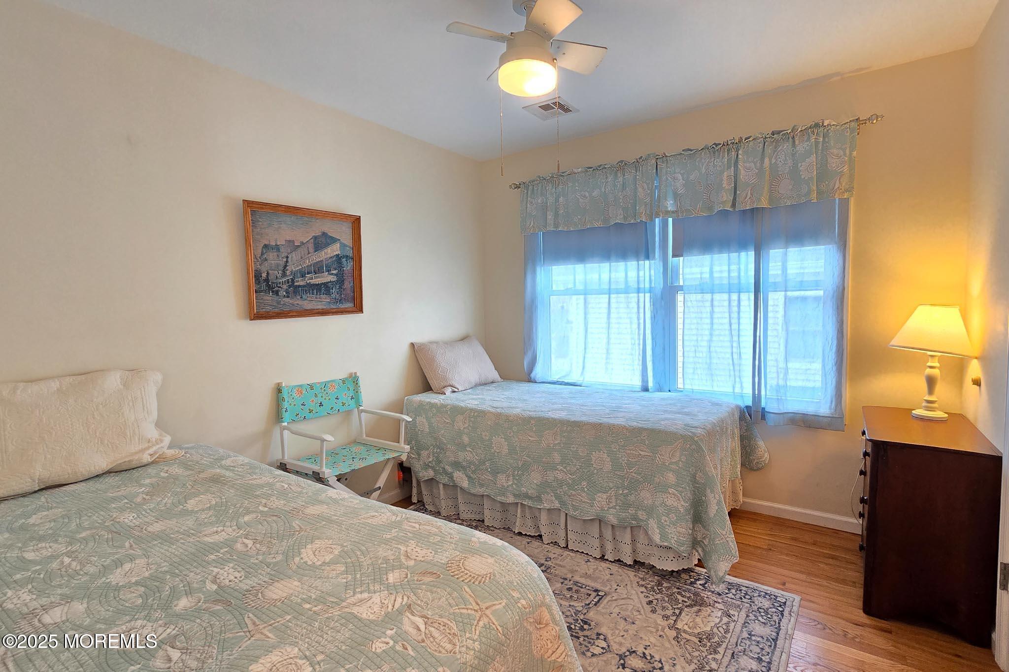 34 South Surf Road Lavallette, NJ 08735 - Photo 34 of 63 a bedroom with 2 bed and a window