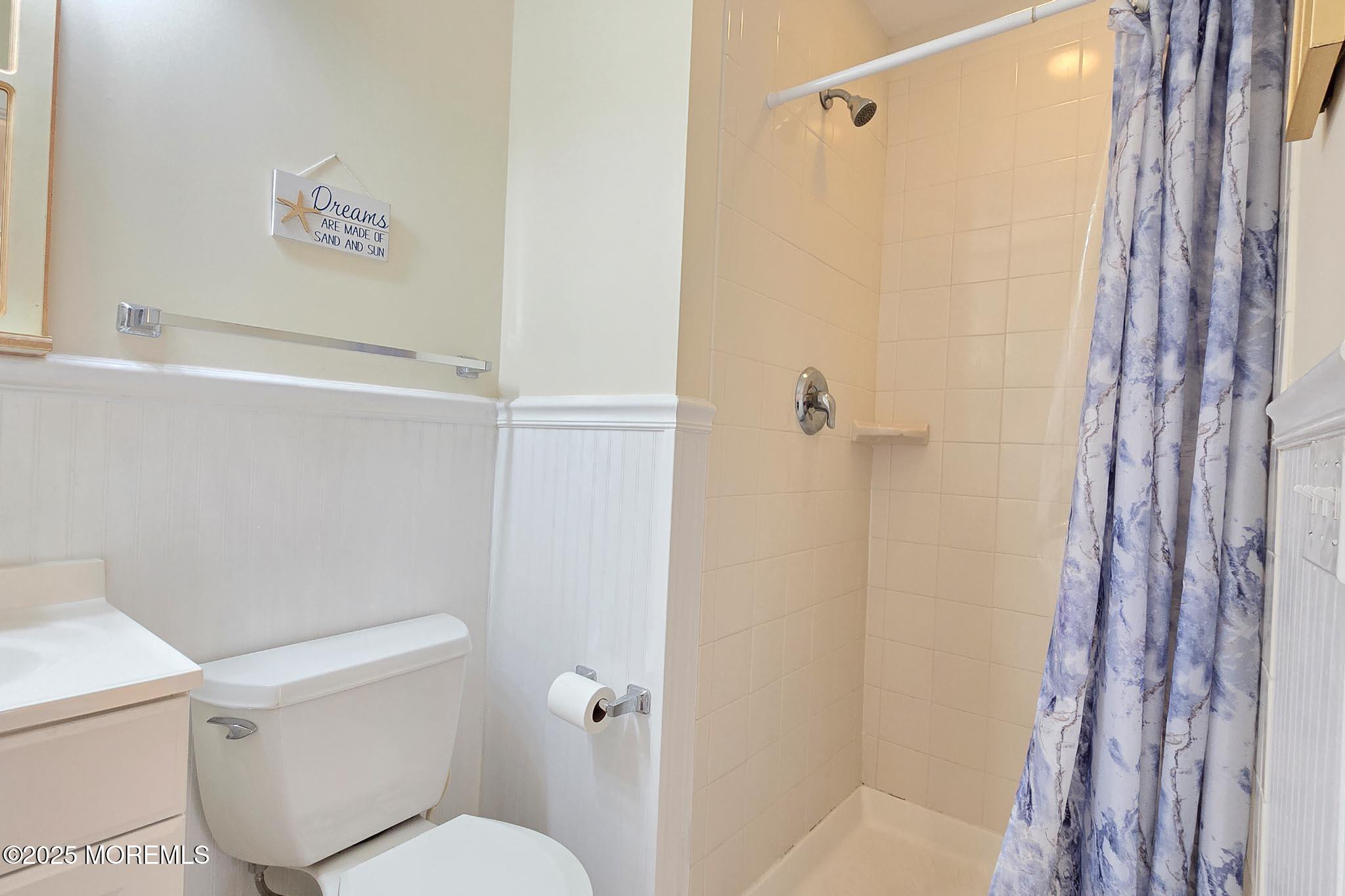 34 South Surf Road Lavallette, NJ 08735 - Photo 37 of 63 a bathroom with a toilet and a shower