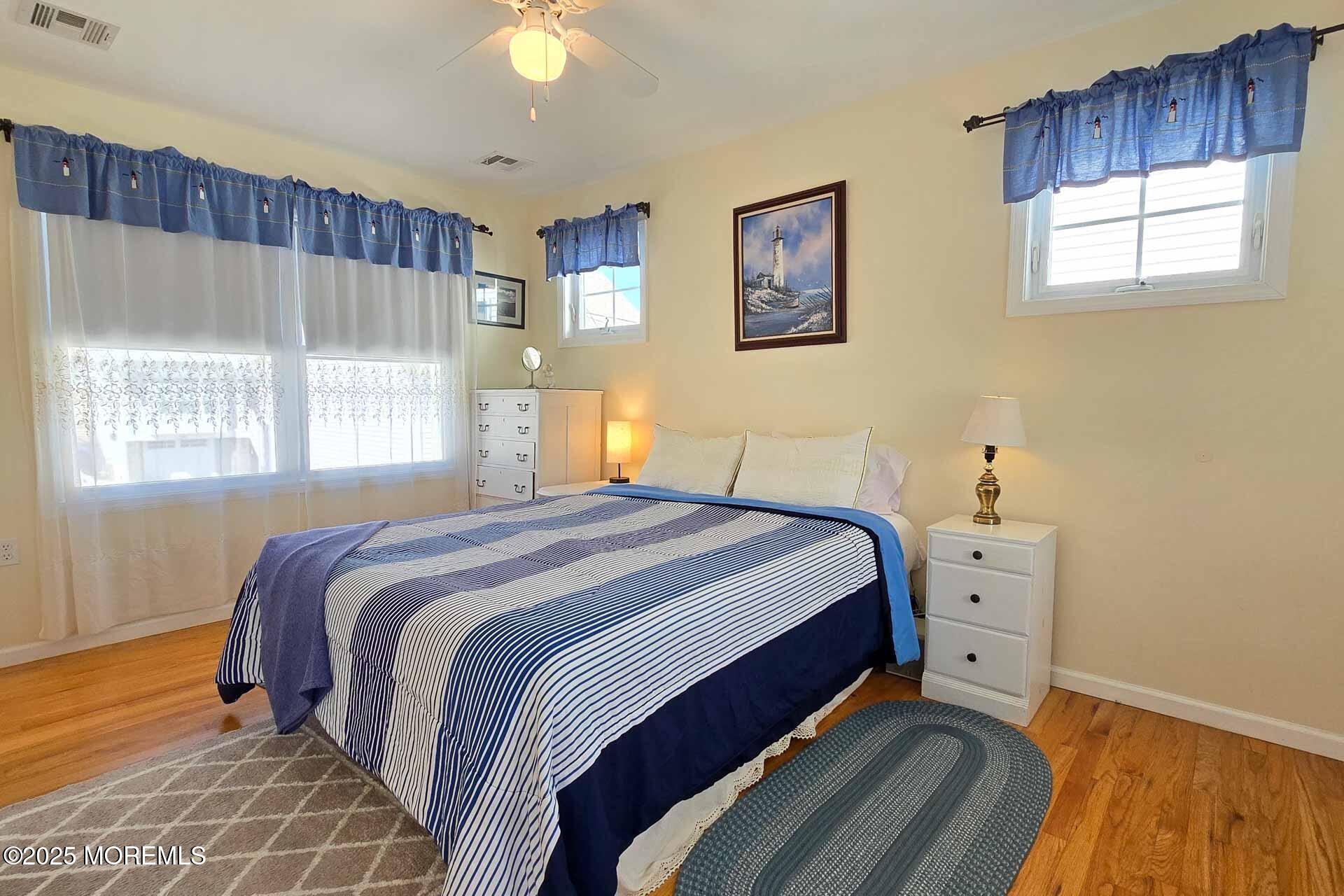 34 South Surf Road Lavallette, NJ 08735 - Photo 42 of 63 a bedroom with a bed and a window