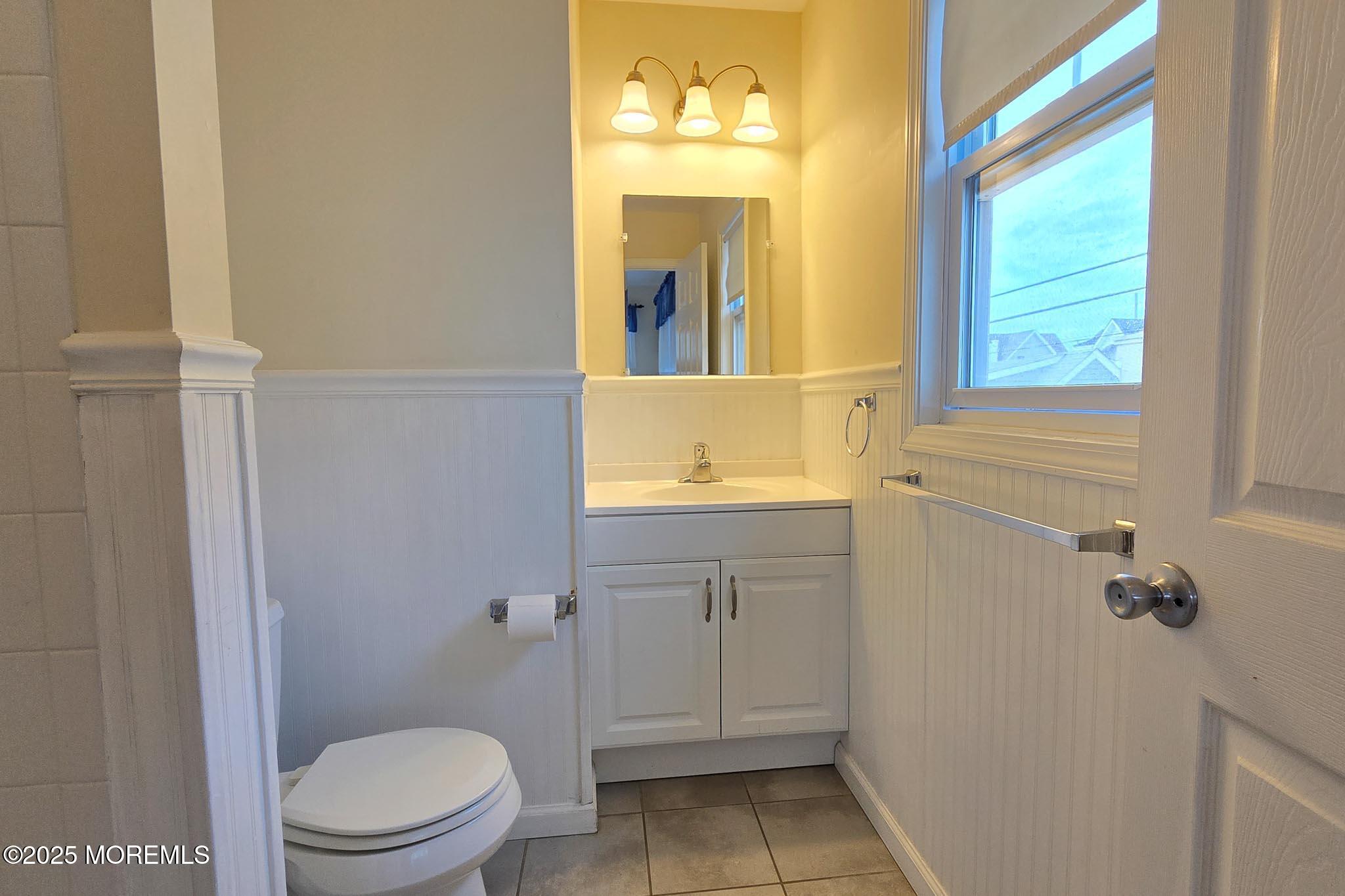 34 South Surf Road Lavallette, NJ 08735 - Photo 45 of 63 a bathroom with a granite countertop sink toilet and mirror