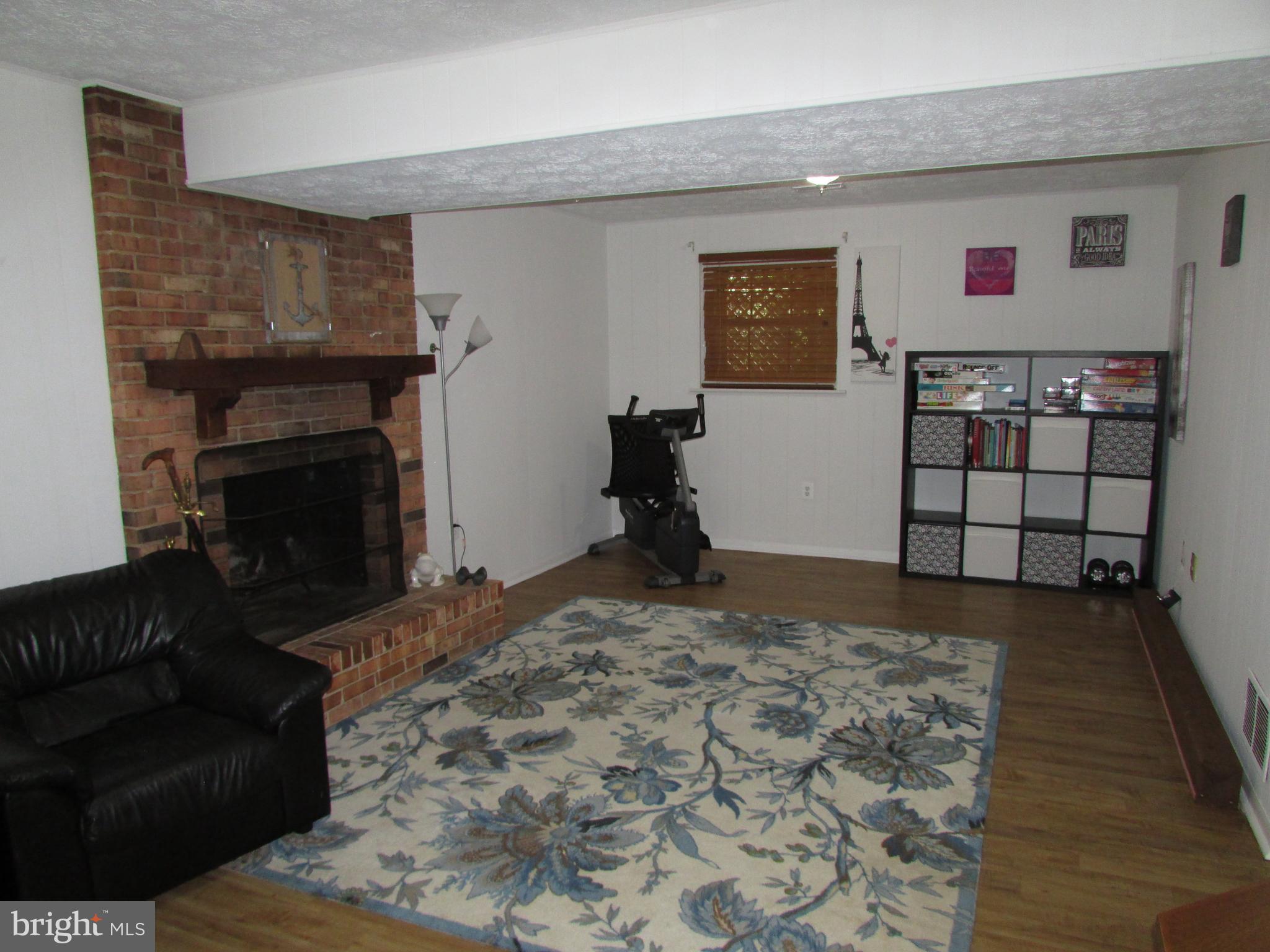 7255 Baldwin Ridge Road Warrenton, VA 20187 - Photo 34 of 45 Cozy Family Room in Basement with FirePlace