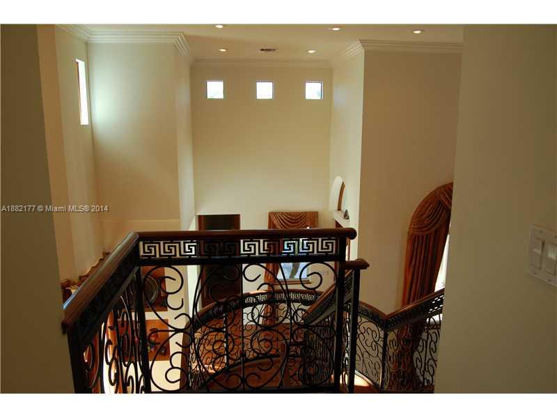 735 Southwest 22nd Road Miami, FL 33129 - Photo 11 of 14 a view of a dining room with furniture and wooden floor