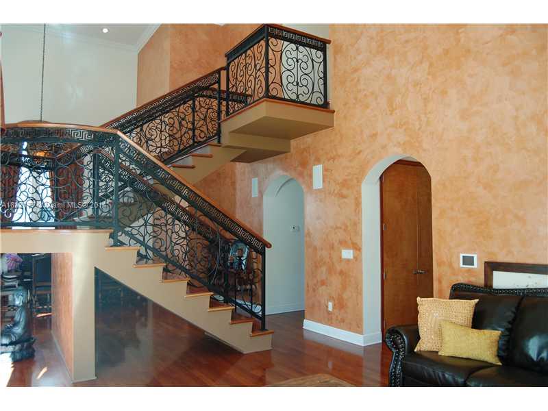 735 Southwest 22nd Road Miami, FL 33129 - Photo 6 of 14 a view of living room and entryway with furniture