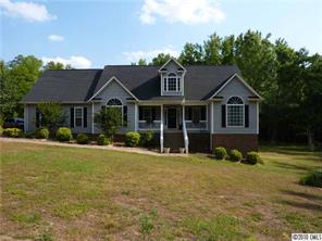 296 East Rebound Road Lancaster, SC 29720 - Photo 1 of 10 a front view of a house with a garden