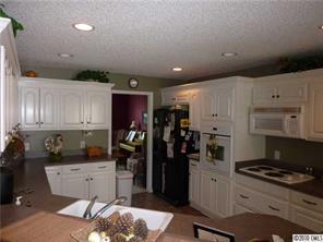 296 East Rebound Road Lancaster, SC 29720 - Photo 5 of 10 a kitchen with refrigerator and cabinets