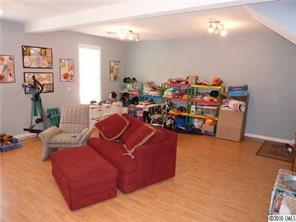 296 East Rebound Road Lancaster, SC 29720 - Photo 6 of 10 a living room with furniture and a gym machine