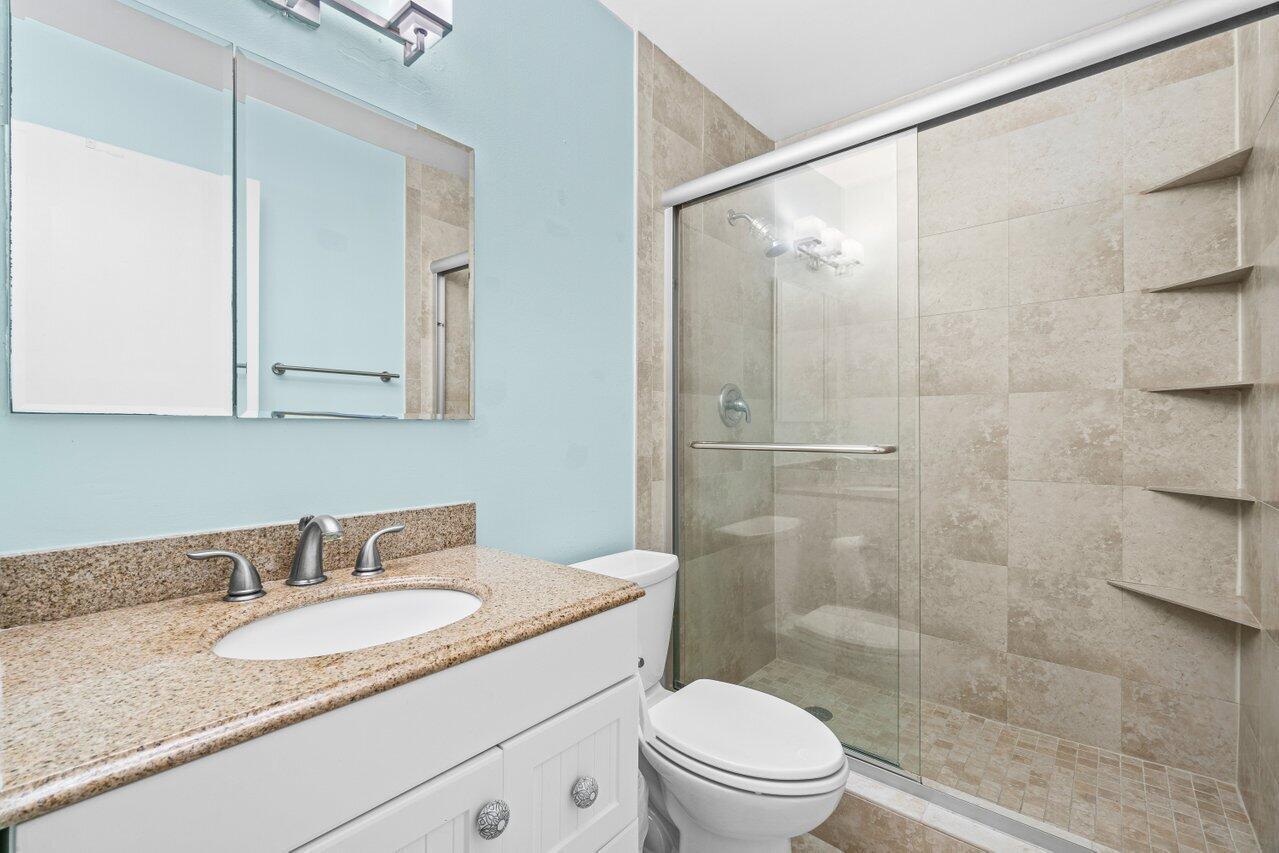 22148 Palms Way, Unit 203 Boca Raton, FL 33433 - Photo 13 of 29 Primary Bath