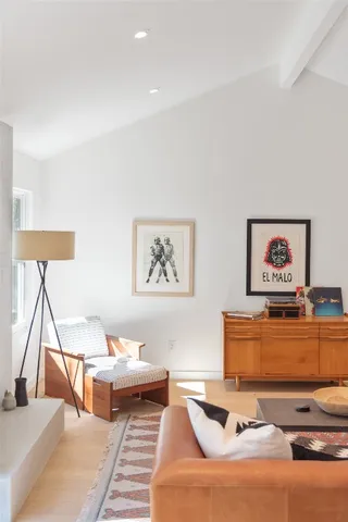 a living room with furniture and a couch