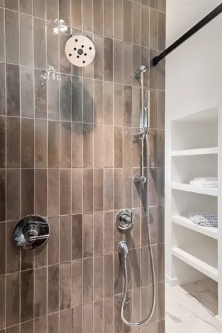 a room with a bed and a window