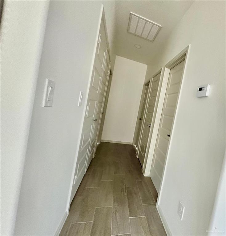 7814 North 58th Street, Unit 3 Mission, TX 78573 - Photo 4 of 11 a view of a hallway view with staircase