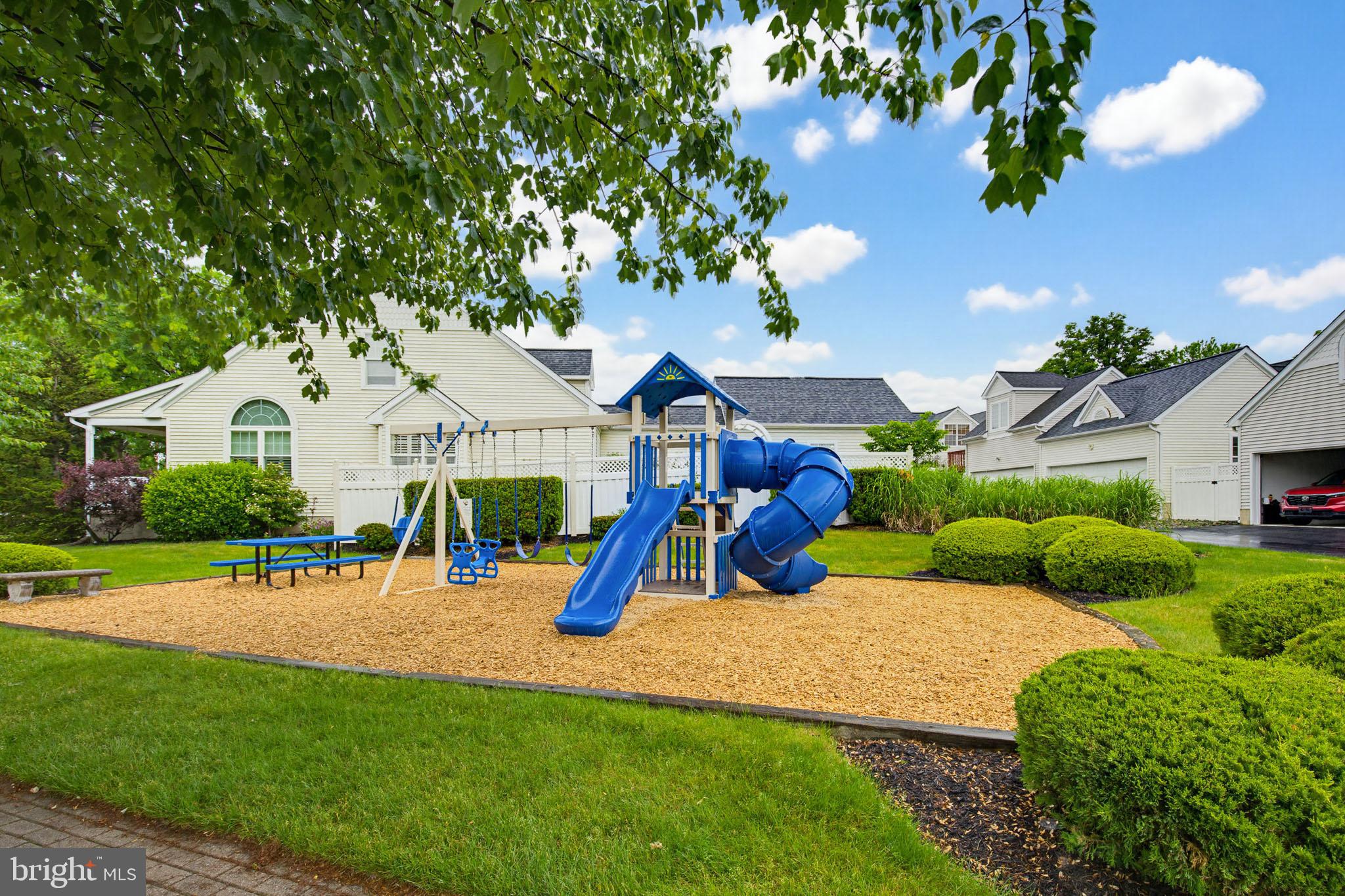 1037 Kent Garden Lititz, PA 17543 - Photo 6 of 31 a view of a house with backyard and a slide