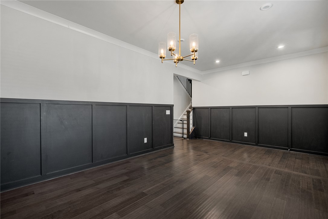 115 Bronson Ridge Anderson, SC 29621 - Photo 6 of 40 Rich wood floors and elegant wainscoting define this versatile formal dining space.