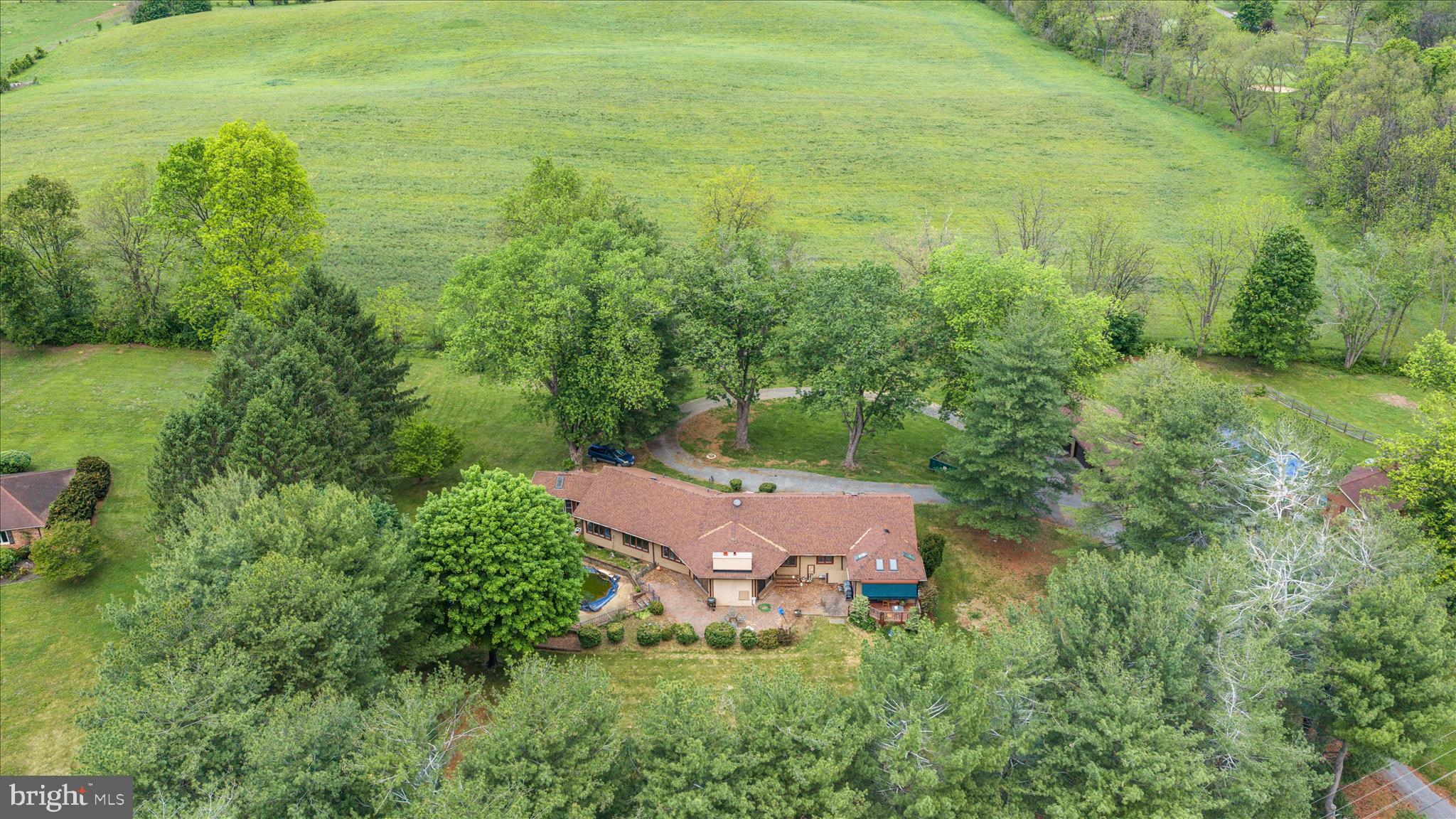 263 Bowling Green Road Front Royal, VA 22630 - Photo 55 of 75 a aerial view of a house with pool outdoor seating and yard
