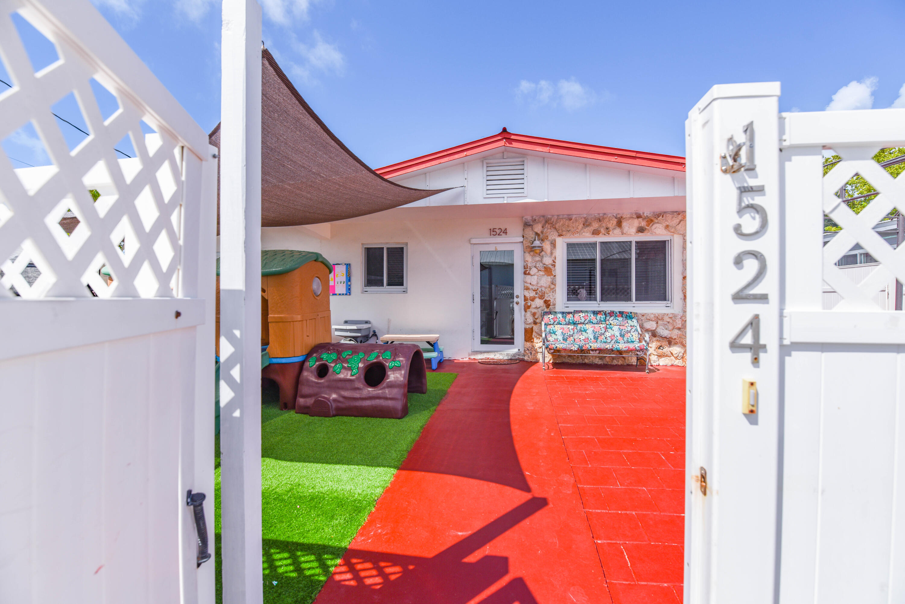 1524 5th Street Key West, FL 33040 - Photo 27 of 31 a outdoor view of a house with outdoor seating
