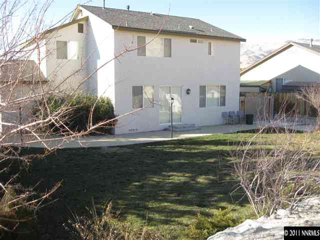 1470 Rainbow Ridge Road Reno, NV 89523 - Photo 13 of 13 a backyard of a house with lots of green space