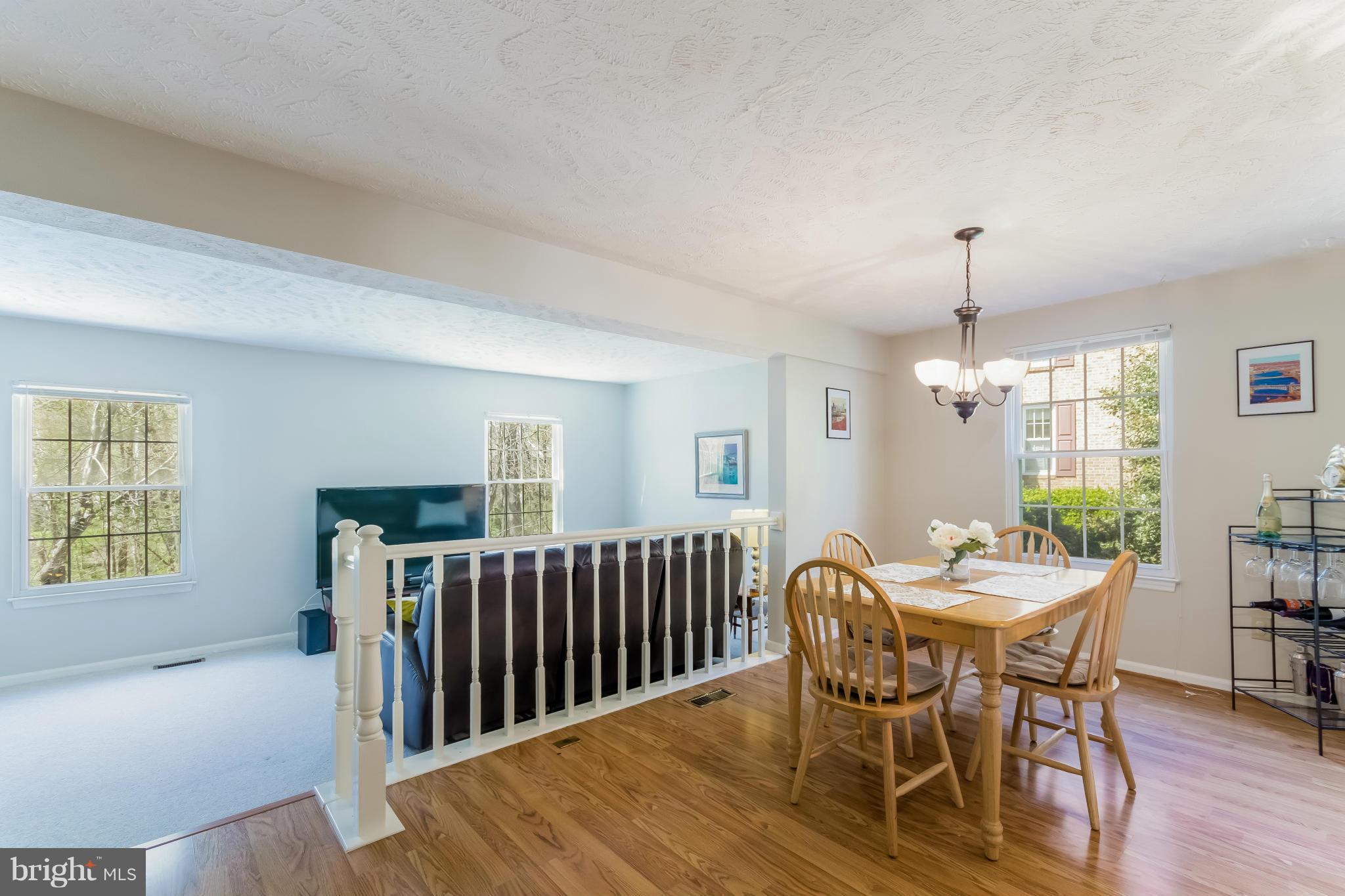 1547 Autumn Ridge Circle Reston, VA 20194 - Photo 13 of 30 a view of a dining room with furniture and window