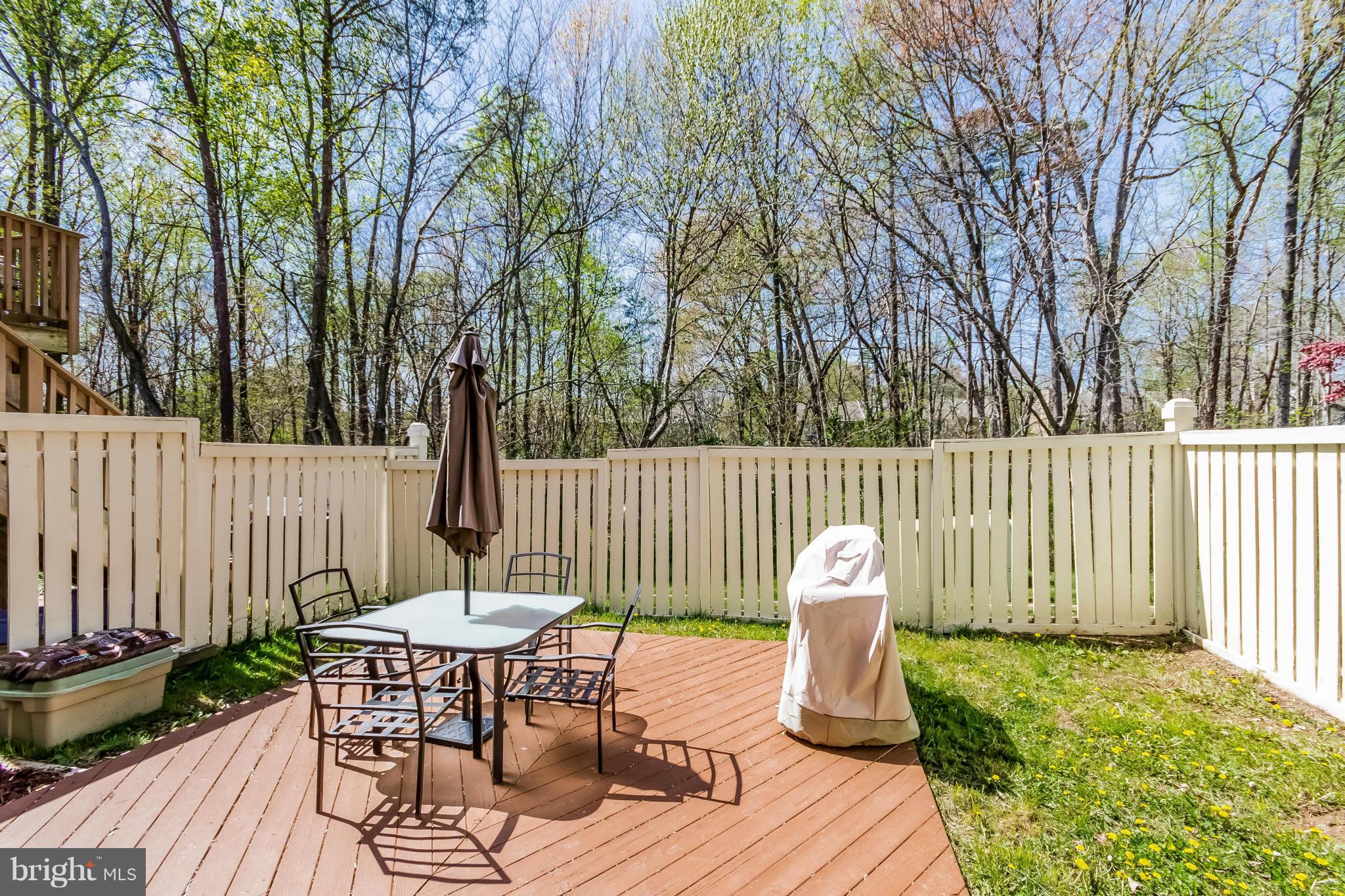 1547 Autumn Ridge Circle Reston, VA 20194 - Photo 30 of 30 a table and chairs in a patio