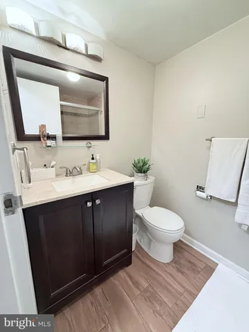 a bathroom with a shower and a bath tub