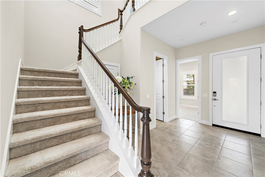 220 Burwood Lake Forest, CA 92630 - Photo 4 of 25 a view of staircase with white walls and white walls