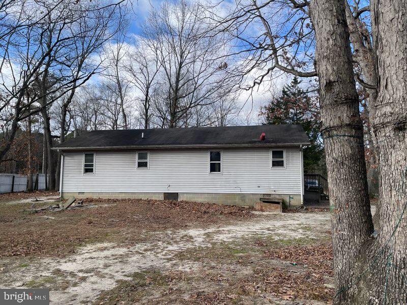 626 Cloverfield Lane Harrington, DE 19952 - Photo 2 of 13 a house that has a tree in front of it with a tree