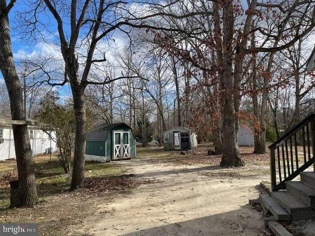 a kitchen with a stove and a microwave