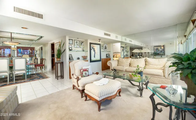 a bathroom with a sink a mirror and a shower