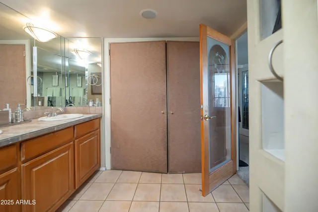 a view of an entryway with wooden floor