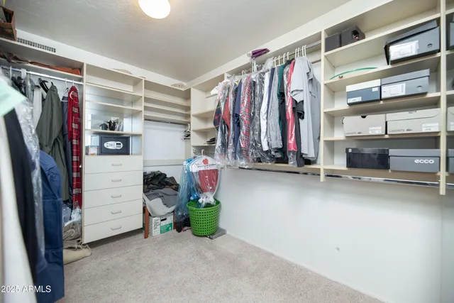 a view of a balcony with chairs
