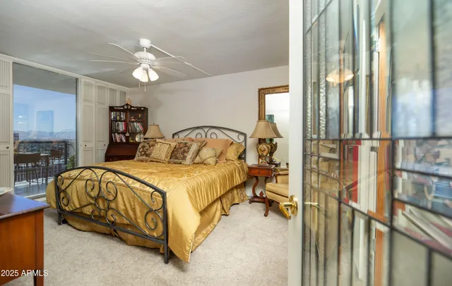 a bed room with a bed and window