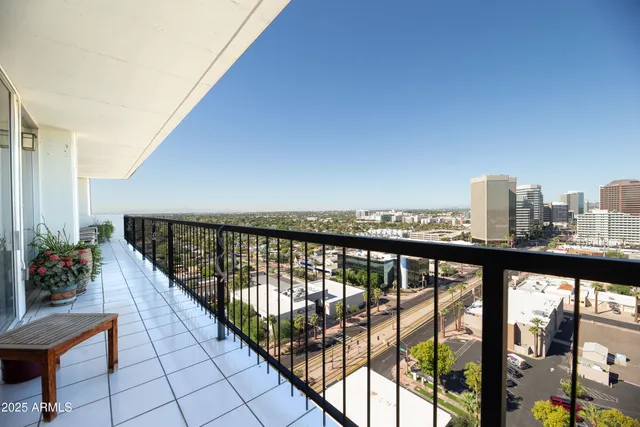 a view of a chairs and tables in the terrace