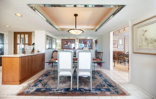 a view of a living room and dining room