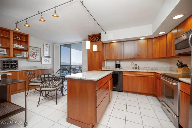 a view of a terrace with furniture and chandelier