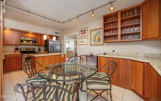 a view of a dining room with furniture