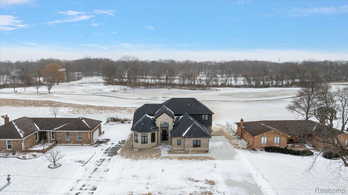 53650 Romeo Plank Road Macomb, MI 48042 - Photo 5 of 64 View of snowy aerial view