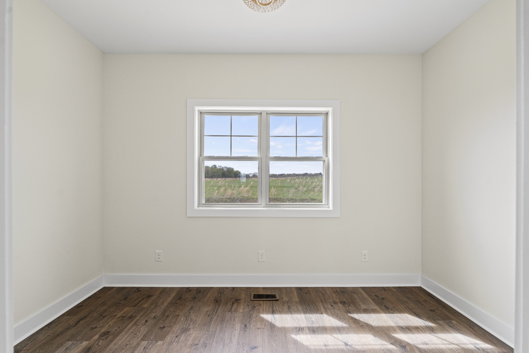 3368 Calista Road White House, TN 37188 - Photo 12 of 37 a view of a room that has wooden floor and a window