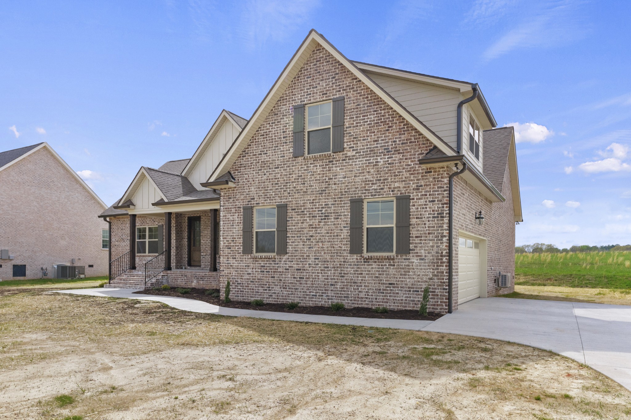 3368 Calista Road White House, TN 37188 - Photo 3 of 37 a front view of a house with a yard and garage