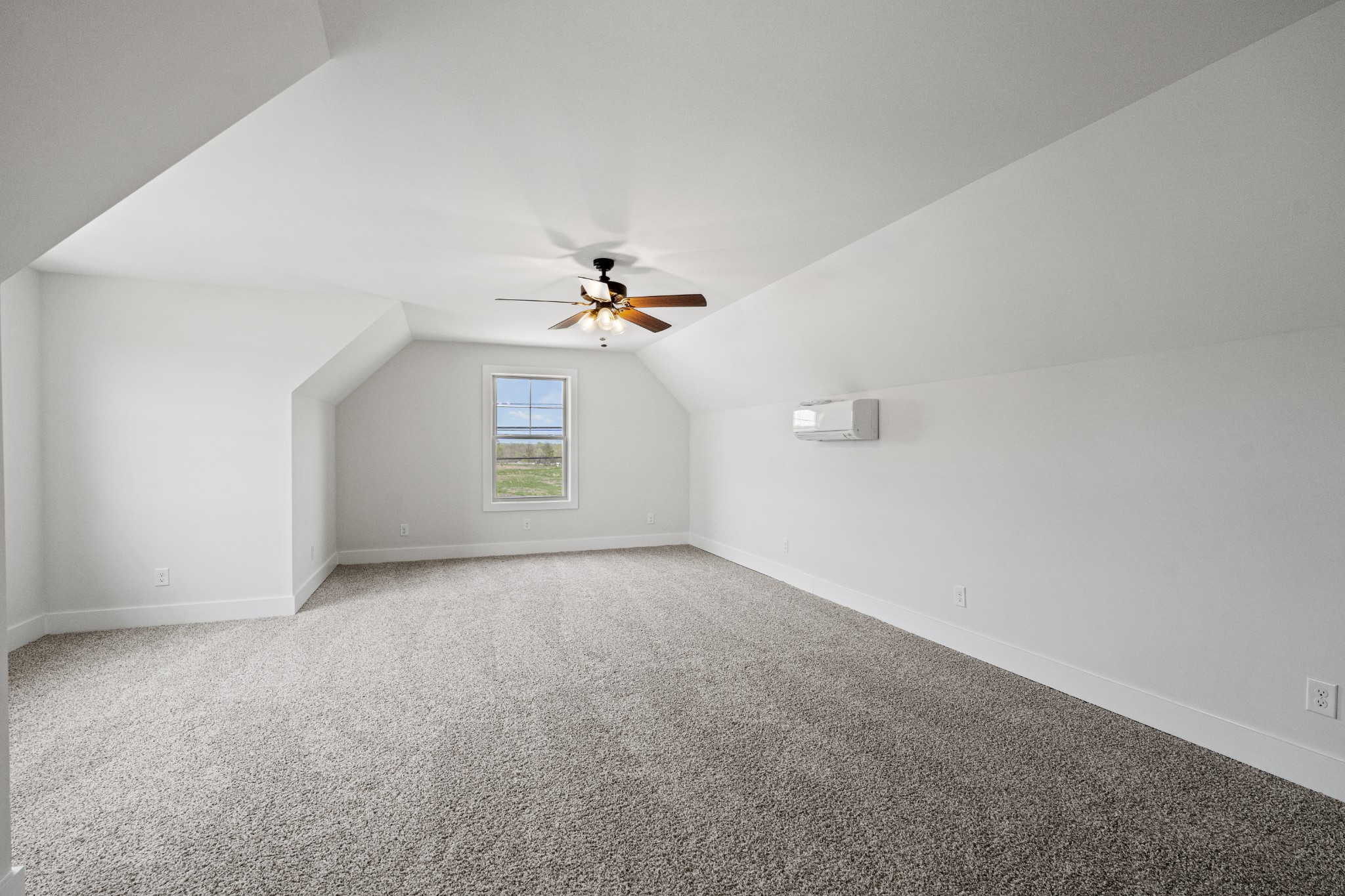 3368 Calista Road White House, TN 37188 - Photo 32 of 37 an empty room with windows and ceiling fan view