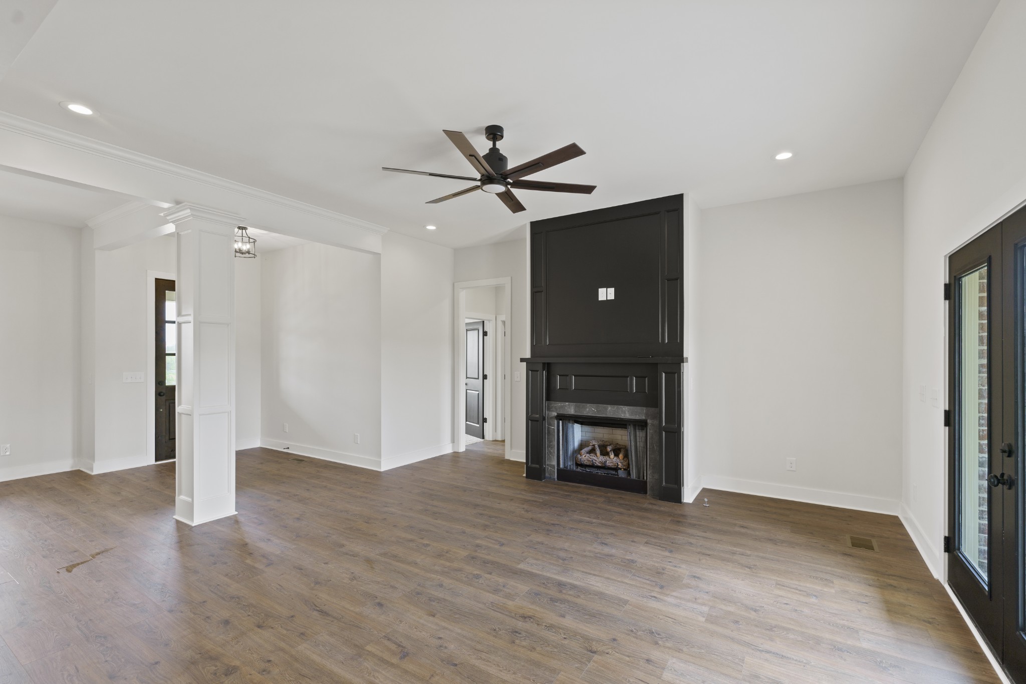 3368 Calista Road White House, TN 37188 - Photo 7 of 37 a view of a livingroom with a fireplace and a chandelier