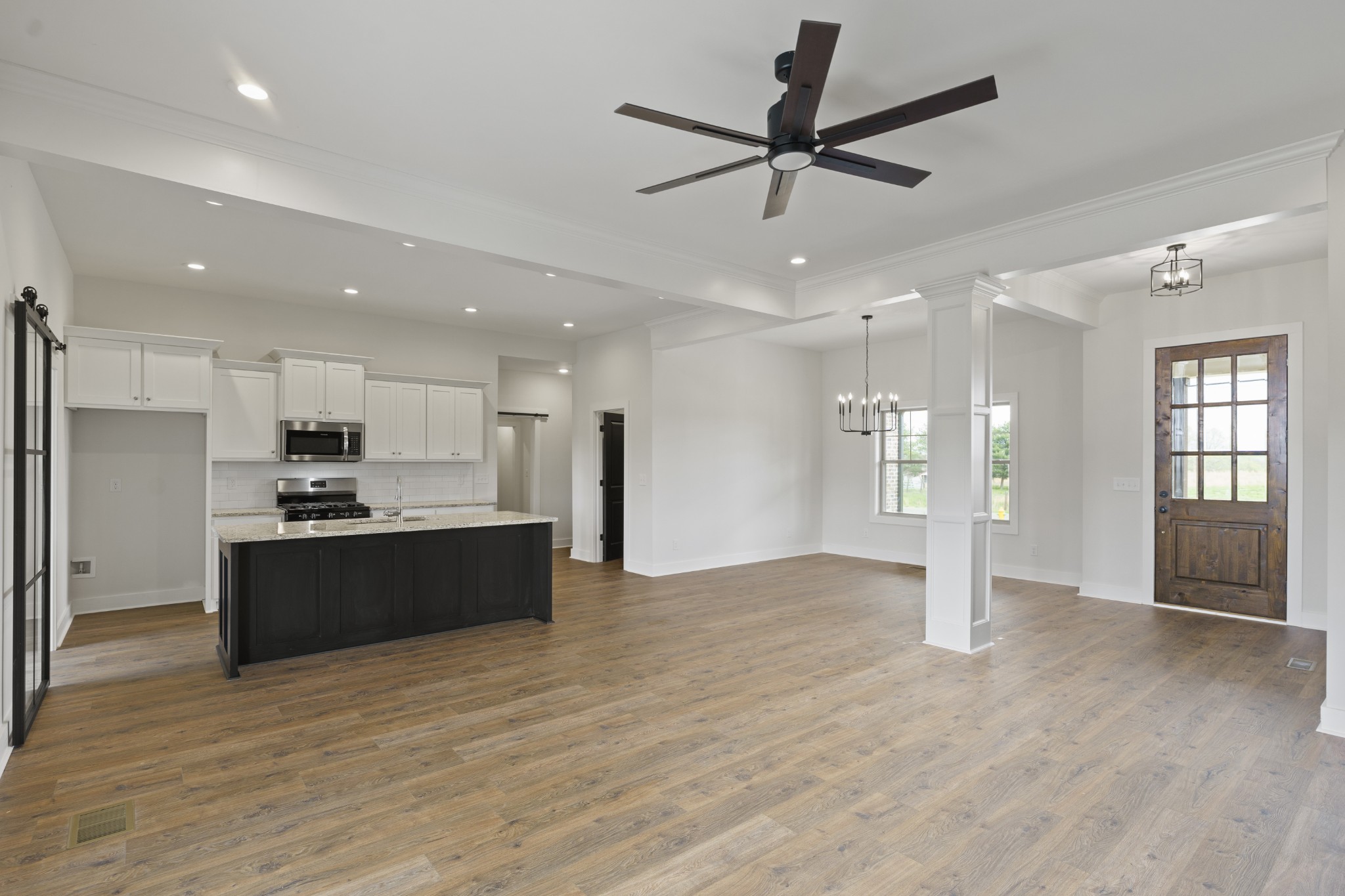 3368 Calista Road White House, TN 37188 - Photo 9 of 37 a large room with a large window and stainless steel appliances